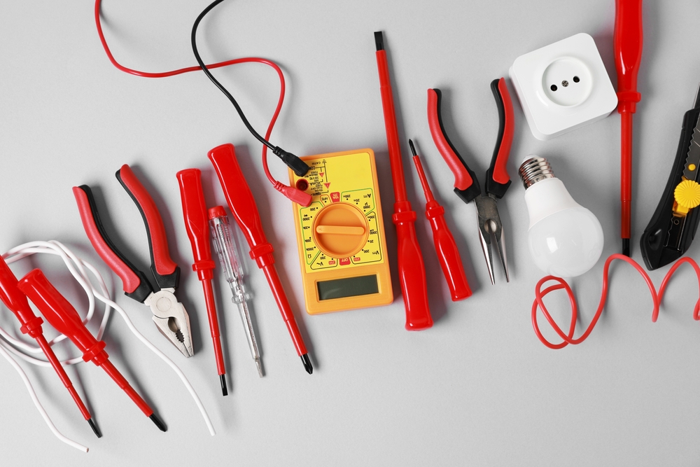 Different,electrical,tools,on,grey,background,,flat,lay